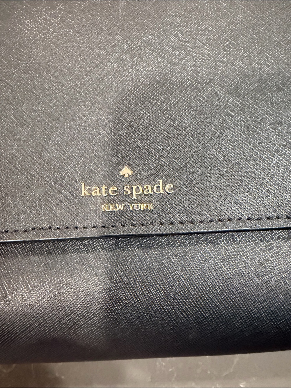 kate spade black leather crossbody with gold logo